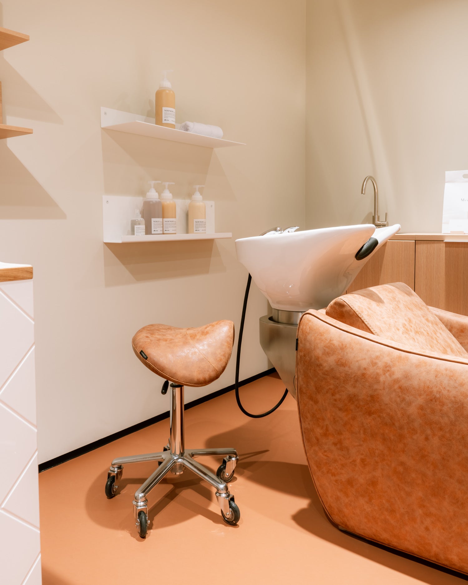 Saddle Tan - Brown saddle stool with chrome cross base